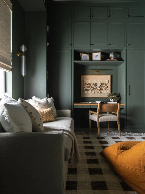 Green Cabinetry with Integrated Desk