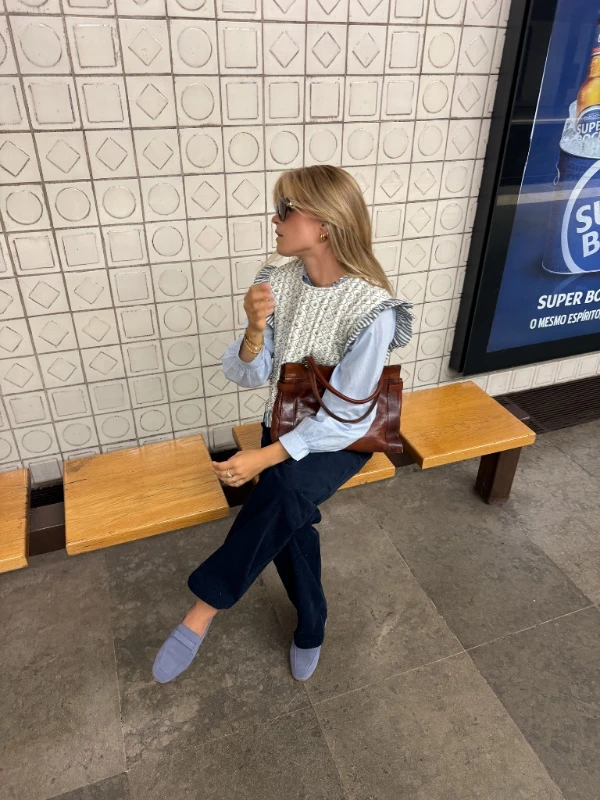 Quilted Vest and Ruffled Blouse