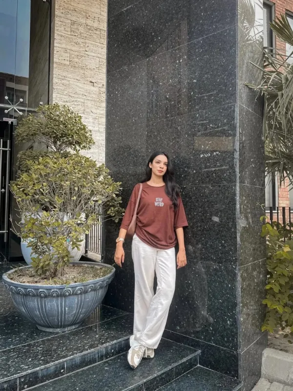 Graphic Tee and Cream Linen Trousers