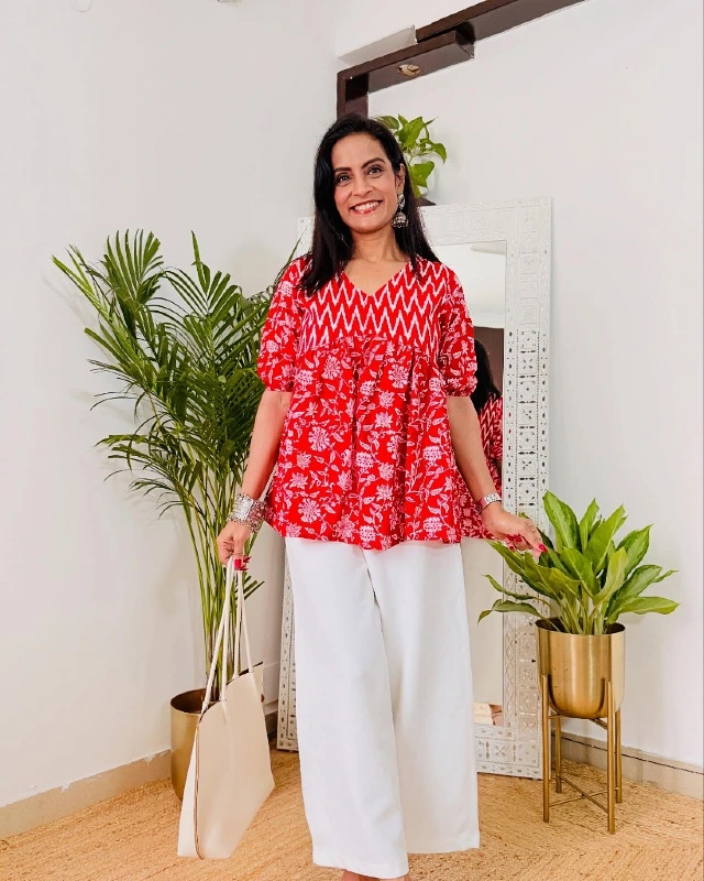 Red Patterned Peplum Top and White Trousers