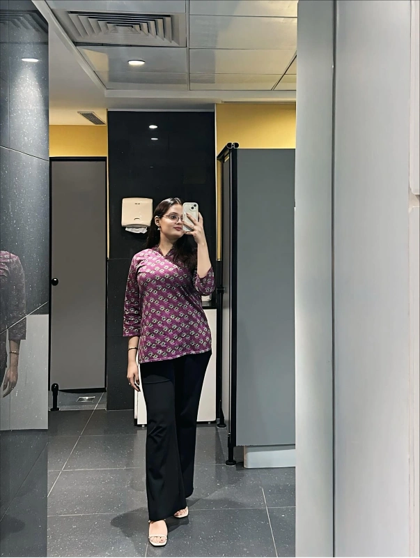 Patterned Plum Kurti and Black Trousers