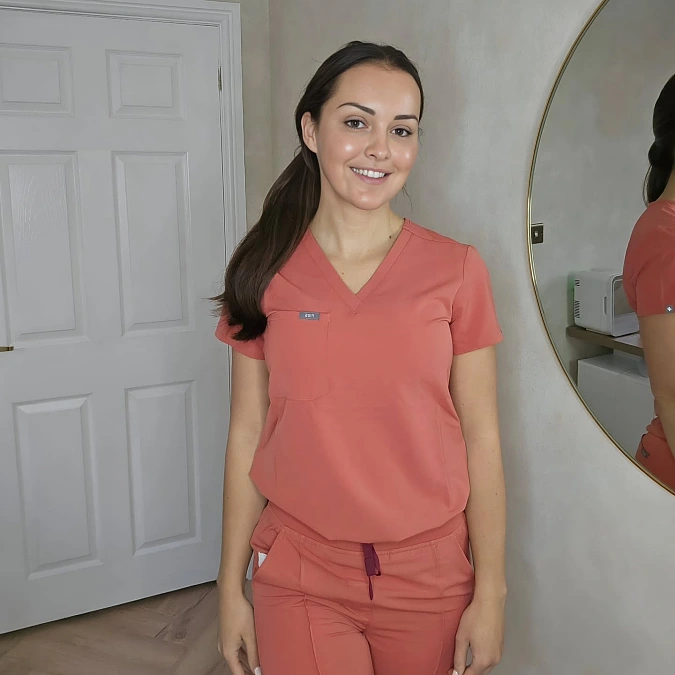 Coral Scrub Set With a Soft Ponytail