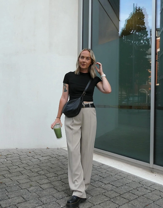 Black Tee + Beige Wide-Leg Trousers