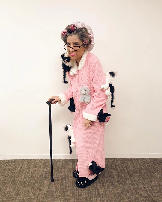 Cat Lady in a Pink Housecoat