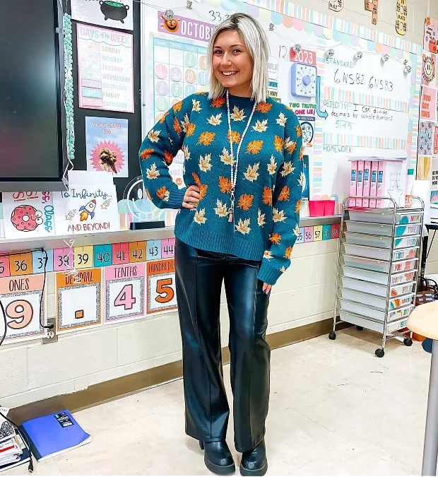 Leaf-Print Sweater + Black Trousers